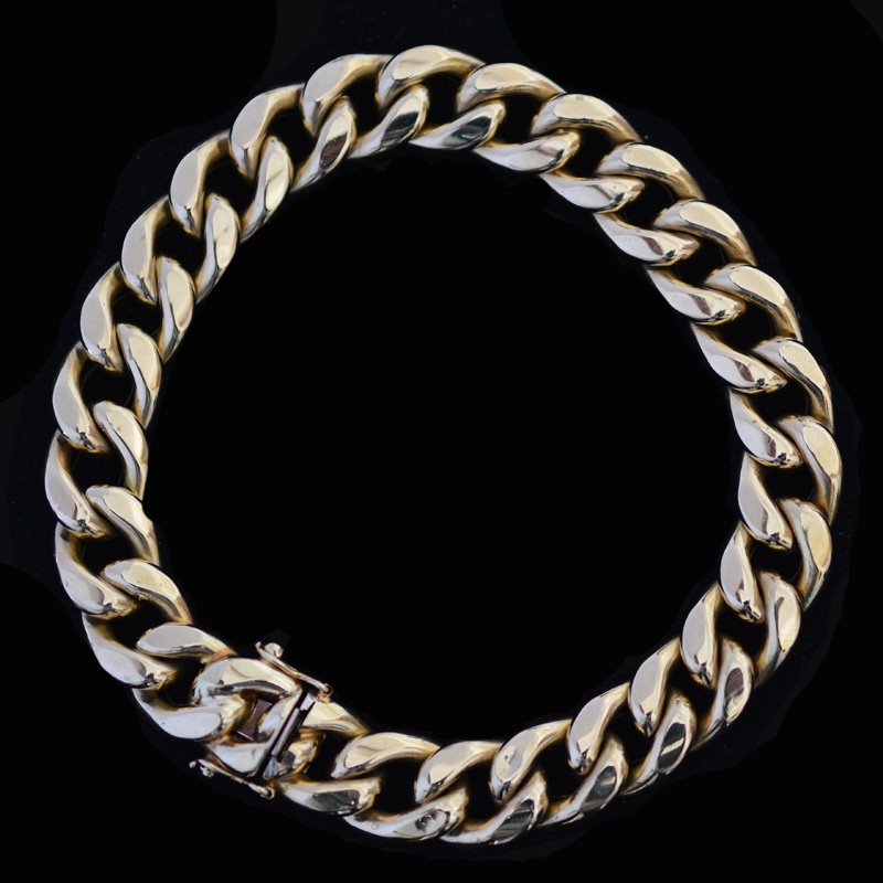 Gold curb link bracelet Rocks and Clocks