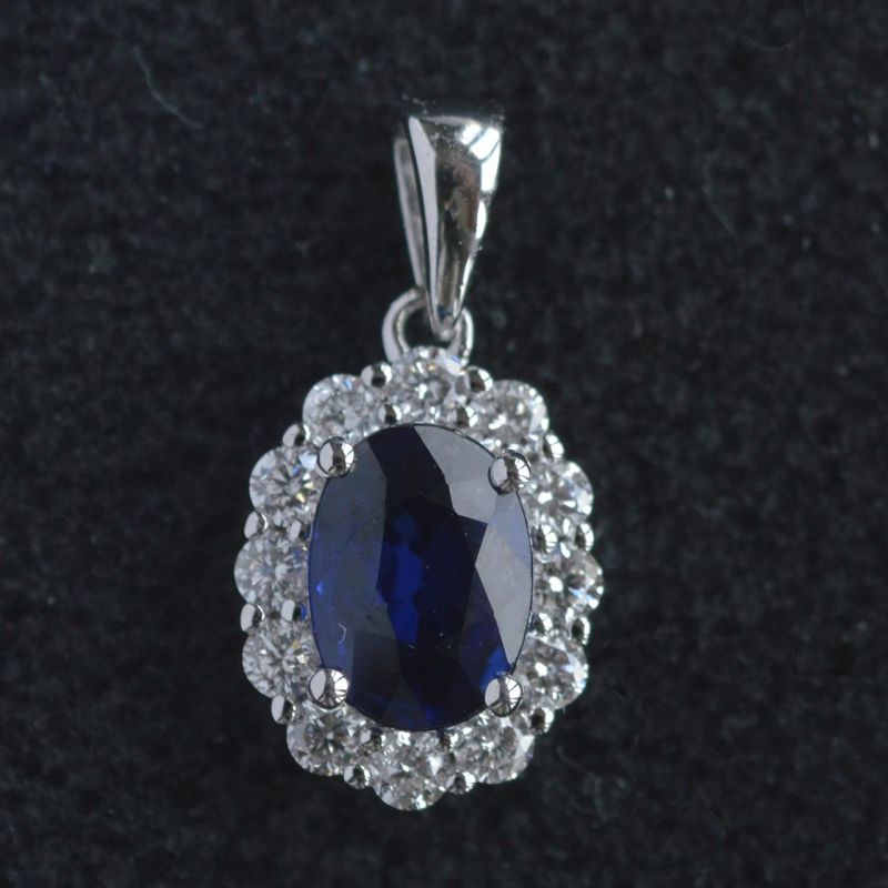 white-gold-oval-blue-sapphire-diamonds-cluster-engagement-pendant-conflict-free-lady-di