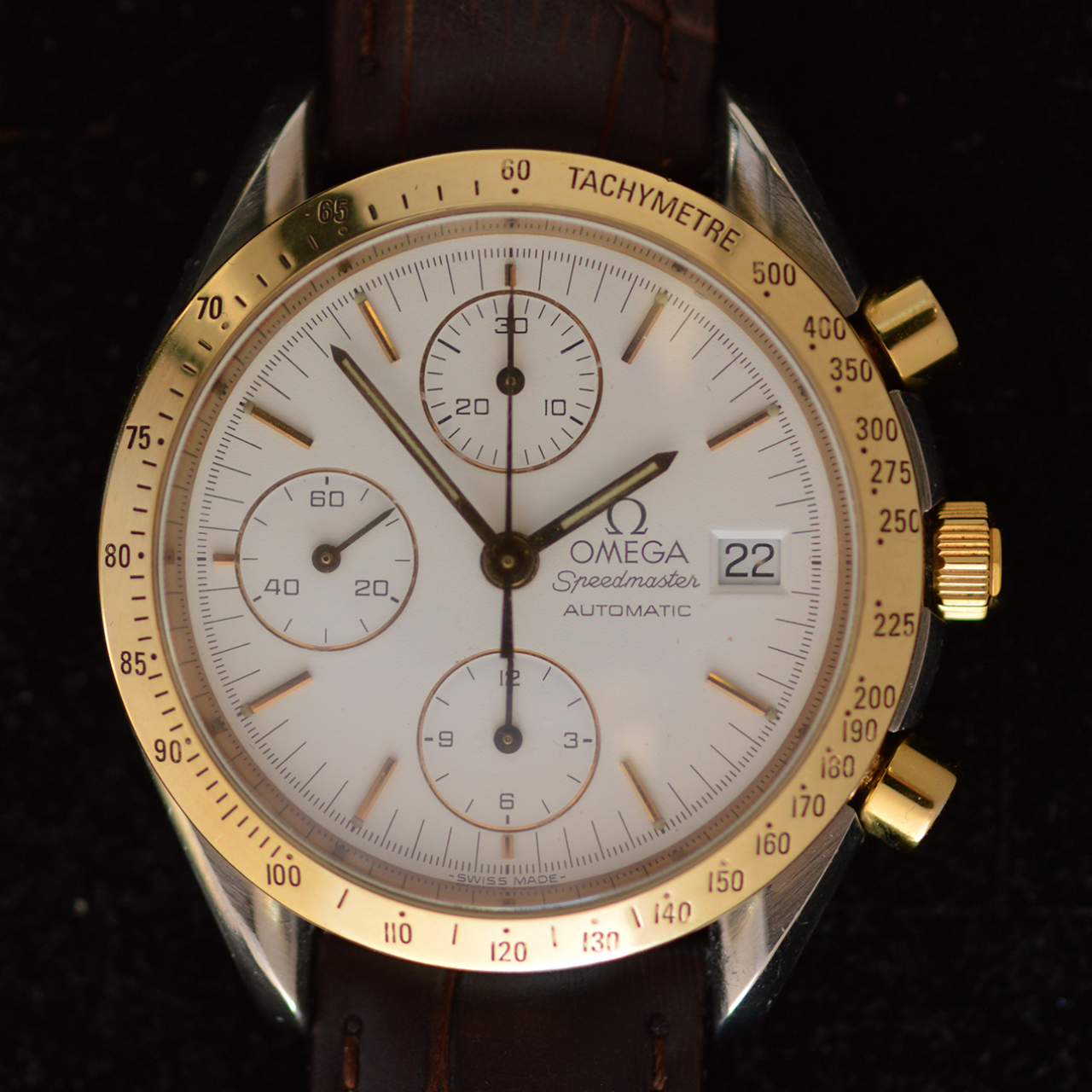 omega speedmaster on wrist