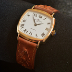 18k-gold-baume-and-mercier-gentlemans-wristwatch-baumatic
