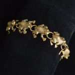 frogs-marching-frog-bracelet-18k-yellow-gold-italian-emerald-1980s