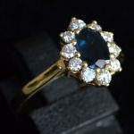 vintage-entourage-ring-yellow-gold-oval-sapphire-round-diamonds-cluster-engagement-lady-di