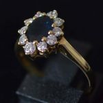vintage-entourage-ring-yellow-gold-oval-sapphire-round-diamonds-cluster-engagement-lady-di