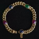 queen-maxima-bracelet-carl-bucherer-18k-gold-curb-link-bracelet-sapphire-ruby-emerald