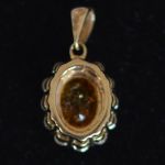 oval-spessartine-mandarin-garnet-conflict-free-diamond-entourage-pendant-lady-di