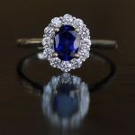 cluster-ring-white-gold-oval-sapphire-round-conflict-free-diamonds-cluster-engagement-lady-di