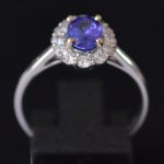 entourage-ring-white-gold-oval-tanzanite-round-diamonds-engagement-halo-cluster-ring-conflict-free-lady-di