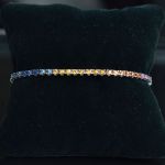 rainbow-sapphire-tennis-bracelet-18-karaat-wit-goud
