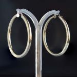 big-white-gold-huggie-hoop-earrings