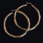 big-white-gold-huggie-hoop-earrings