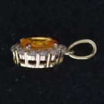 oval-spessartine-mandarin-garnet-conflict-free-diamond-entourage-pendant-lady-di