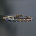 rainbow-sapphire-tennis-bracelet-18-karaat-bezel-set-red-pink-goud