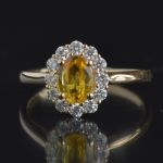 entourage-ring-yellow-gold-oval-yellow-sapphire-diamonds-cluster-engagement-ring-conflict-free-lady-di