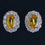 entourage-earrings-yellow-gold-oval-yellow-sapphire-round-conflict-free-diamonds-halo-cluster-lady-di