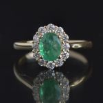 entourage-ring-yellow-gold-oval-emerald-diamonds-halo-engagement-ring-conflict-free-lady-di