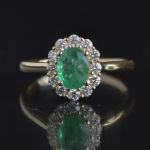 entourage-ring-yellow-gold-oval-emerald-diamonds-helo-engagement-ring-conflict-free-lady-di