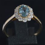 entourage-ring-yellow-gold-oval-aquamarine-diamonds-cluster-engagement-ring-conflict-free-lady-di