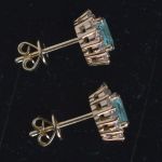 entourage-earrings-white-gold-oval-paraiba-tourmaline-round-conflict-free-diamonds-cluster-lady-di