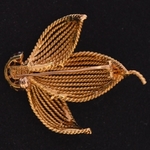 50-s-rope-turned-gold-ruby-brooch-tiffany-co