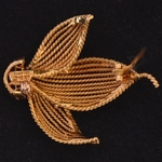 50-s-rope-turned-gold-ruby-brooch-tiffany-co