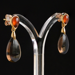 18k-gold-2lips-colours-smoky-quartz-mandarin-garnet-earrings-design-david-aardewerk